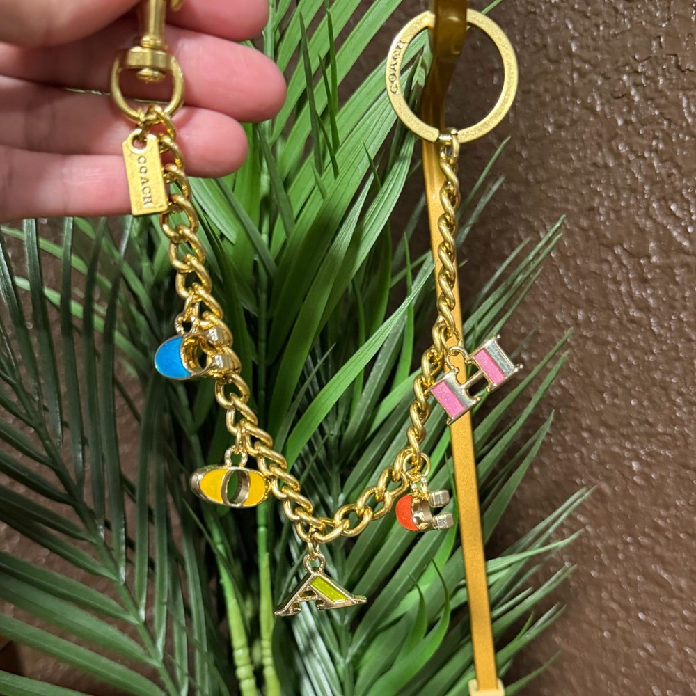 Coach letters charm